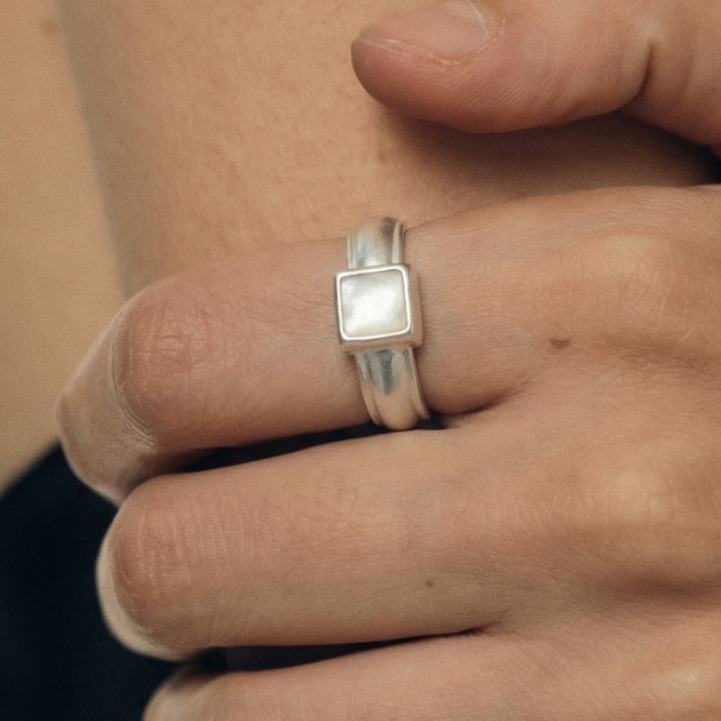 Handcrafted Sterling Silver Ring with Black Onyx and Mother of Pearl — original source image