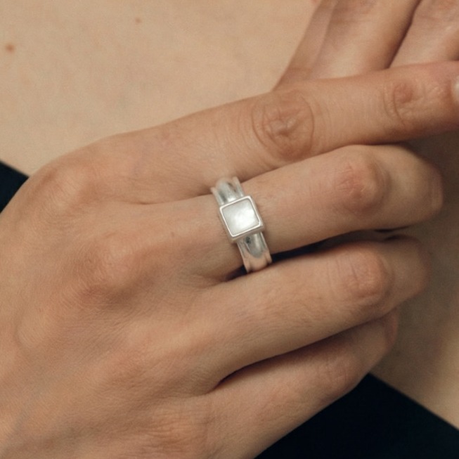 Handcrafted Sterling Silver Ring with Black Onyx and Mother of Pearl — original source image