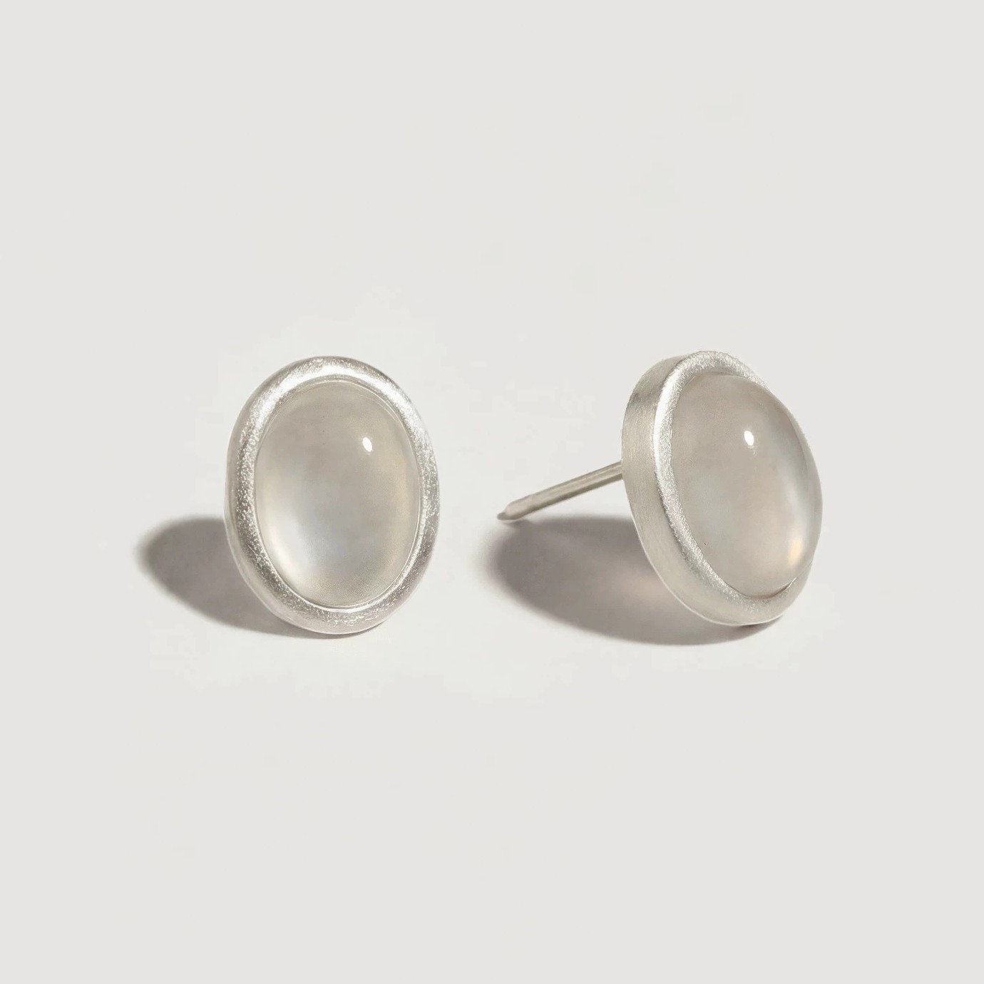White Agate Stud Earrings with Sterling Silver Rim — original source image