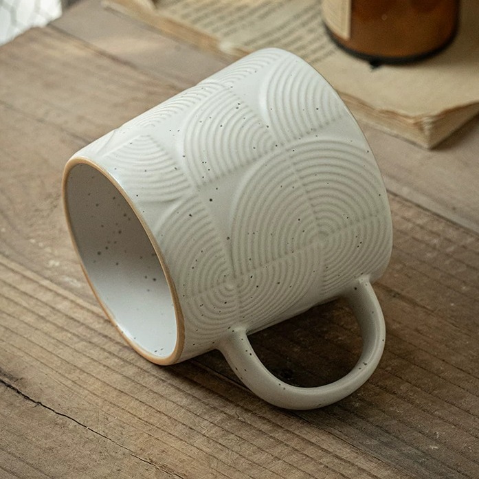 Minimalist Ceramic Mug with Subtle Relief Texture product view