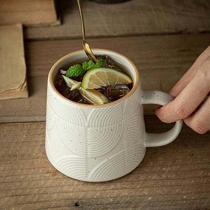 Minimalist Ceramic Mug with Subtle Relief Texture product view
