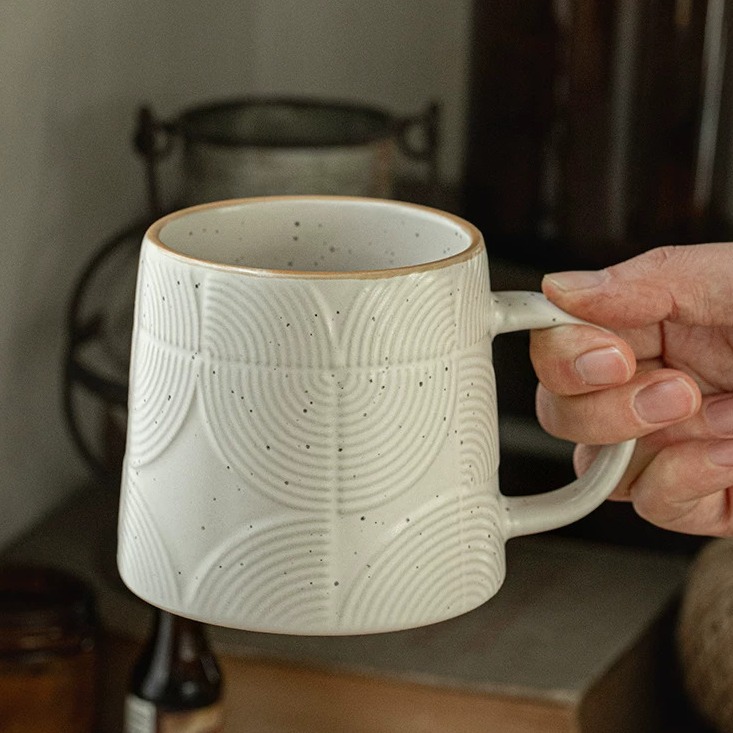 Minimalist Ceramic Mug with Subtle Relief Texture product view